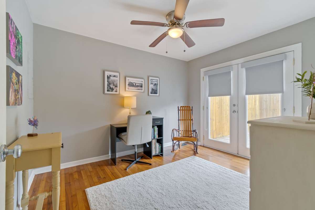 The back bedroom has an entrance to the back deck for morning coffee or as an extension of your interior space.