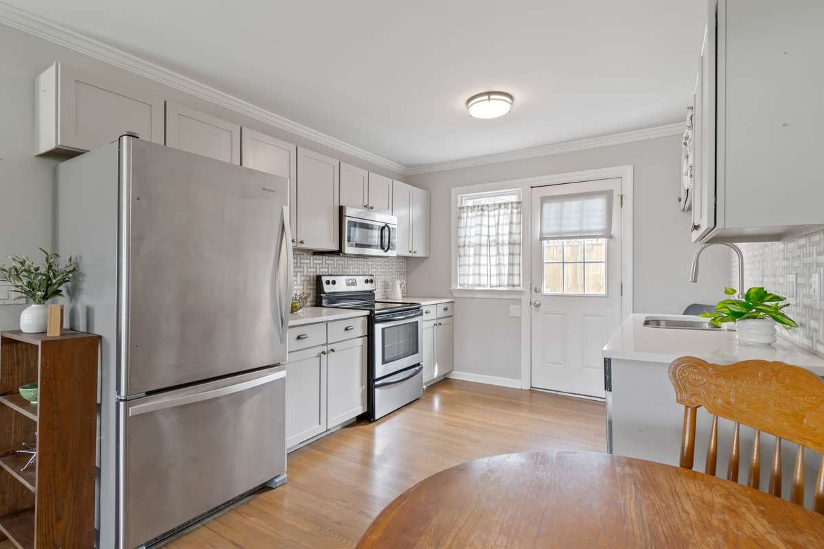Natural light enters from the front and the back of the condo.