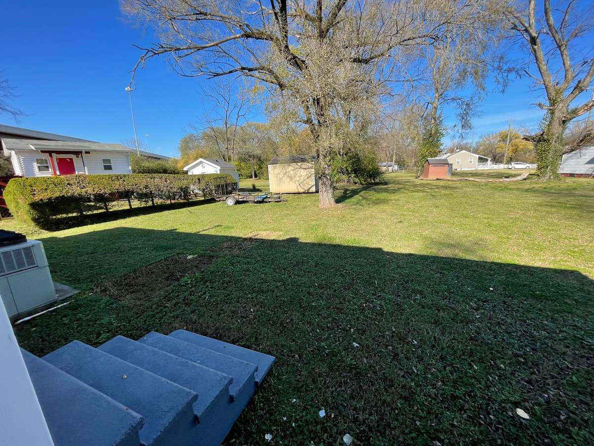 Spacious back yard and storage shed