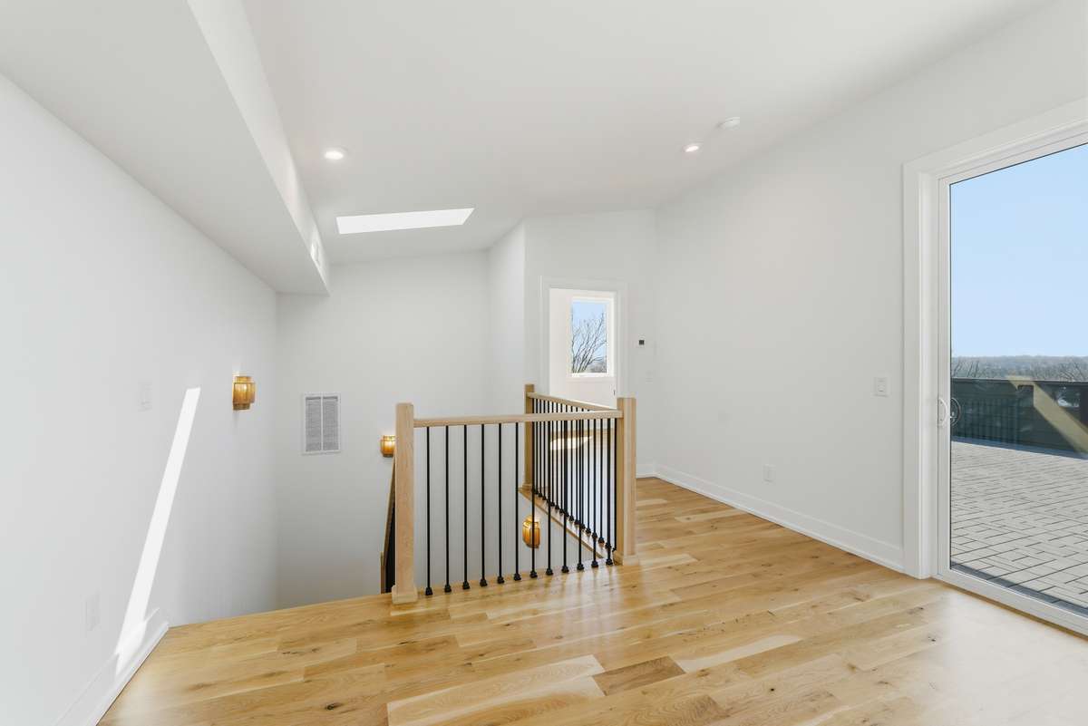 Rooftop Lounge and entrance to Bedroom 5/ Home Office