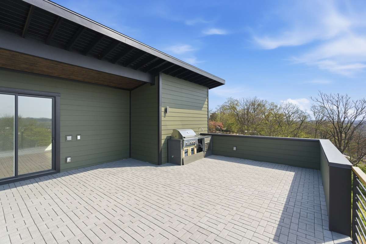 Outdoor Kitchen, grill, and sink. Rooftop structurally planned for optional hot tub.