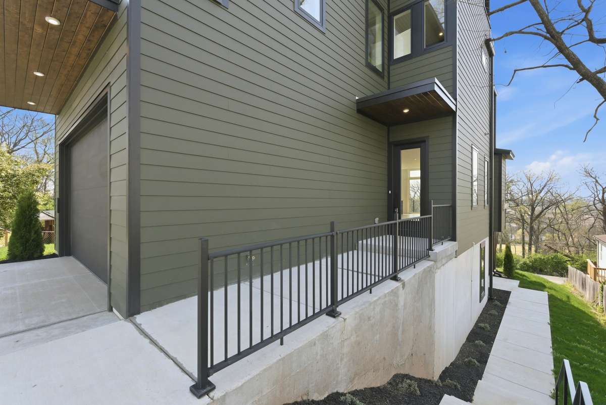 Designed for versatility: separate exterior entry to the lower level creates ideal potential for a private suite, rental, wellness room or home gym, or work-from-home space.