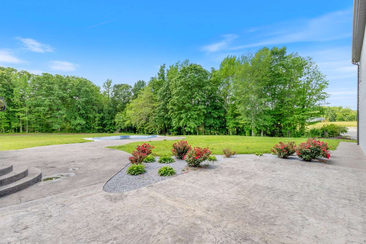 Salt water above ground inset pool and walking trails with a spring fed creek to the back