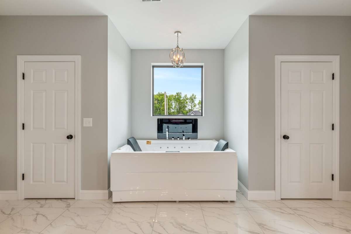 And two person tub with lights, jets, radio and fireplace