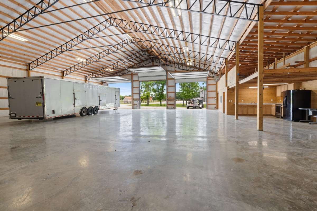 Beautiful shop with heated floors, kitchen, office and half bath!!