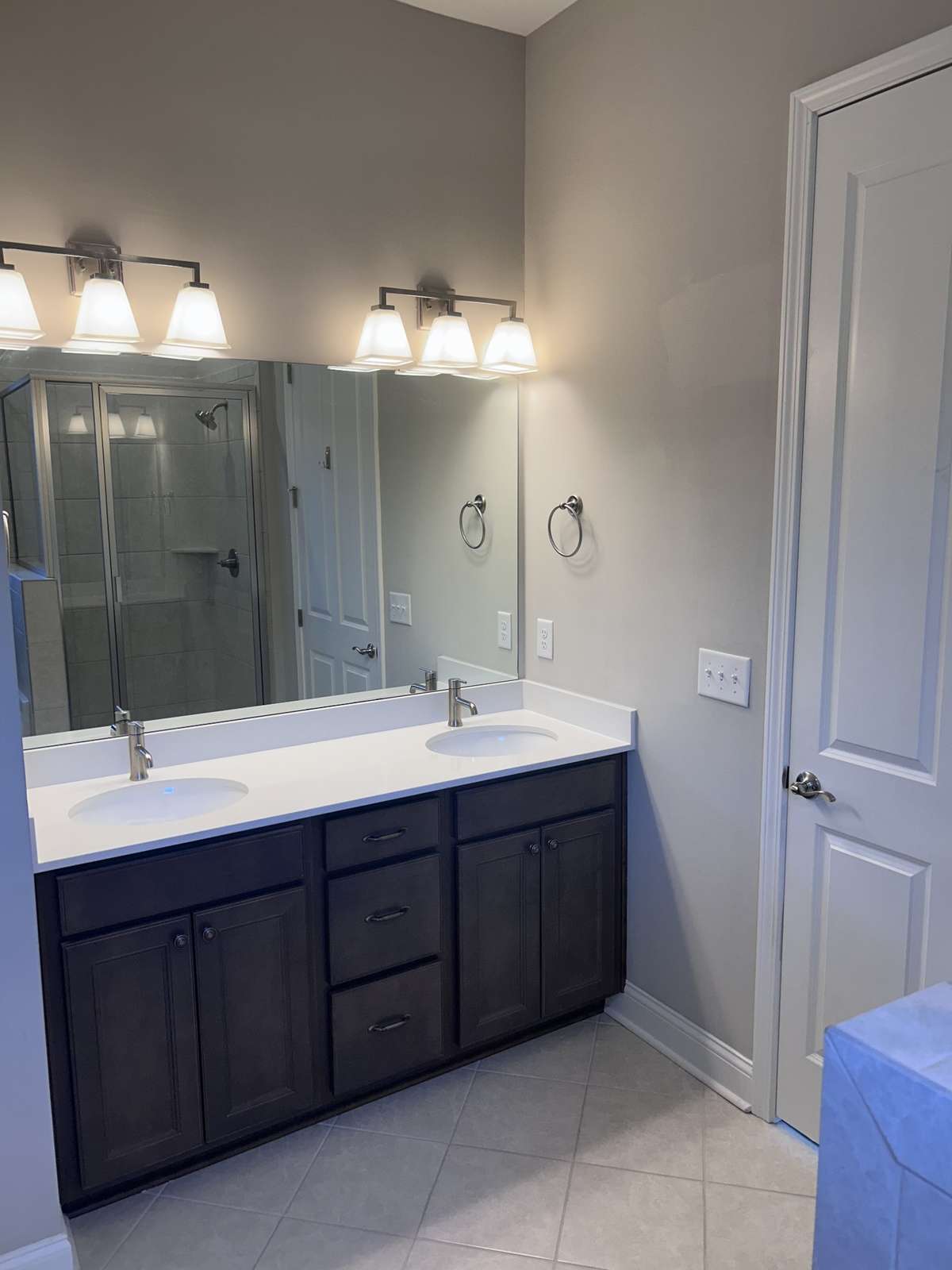Primary Bedroom Bath has a beautiful double sink vanity, Quartz counter top