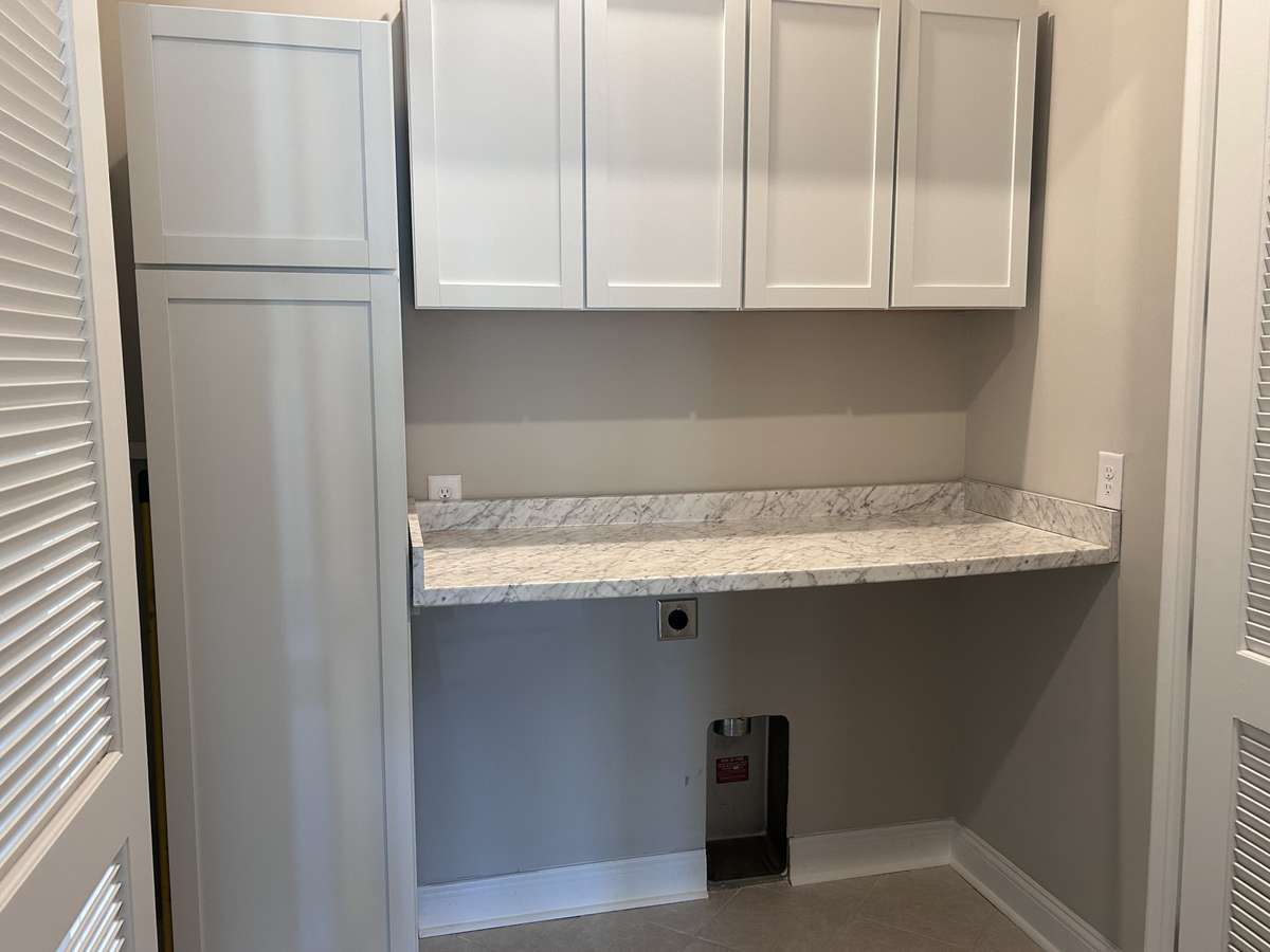 Beautifully done Cabinetry by owners in laundry