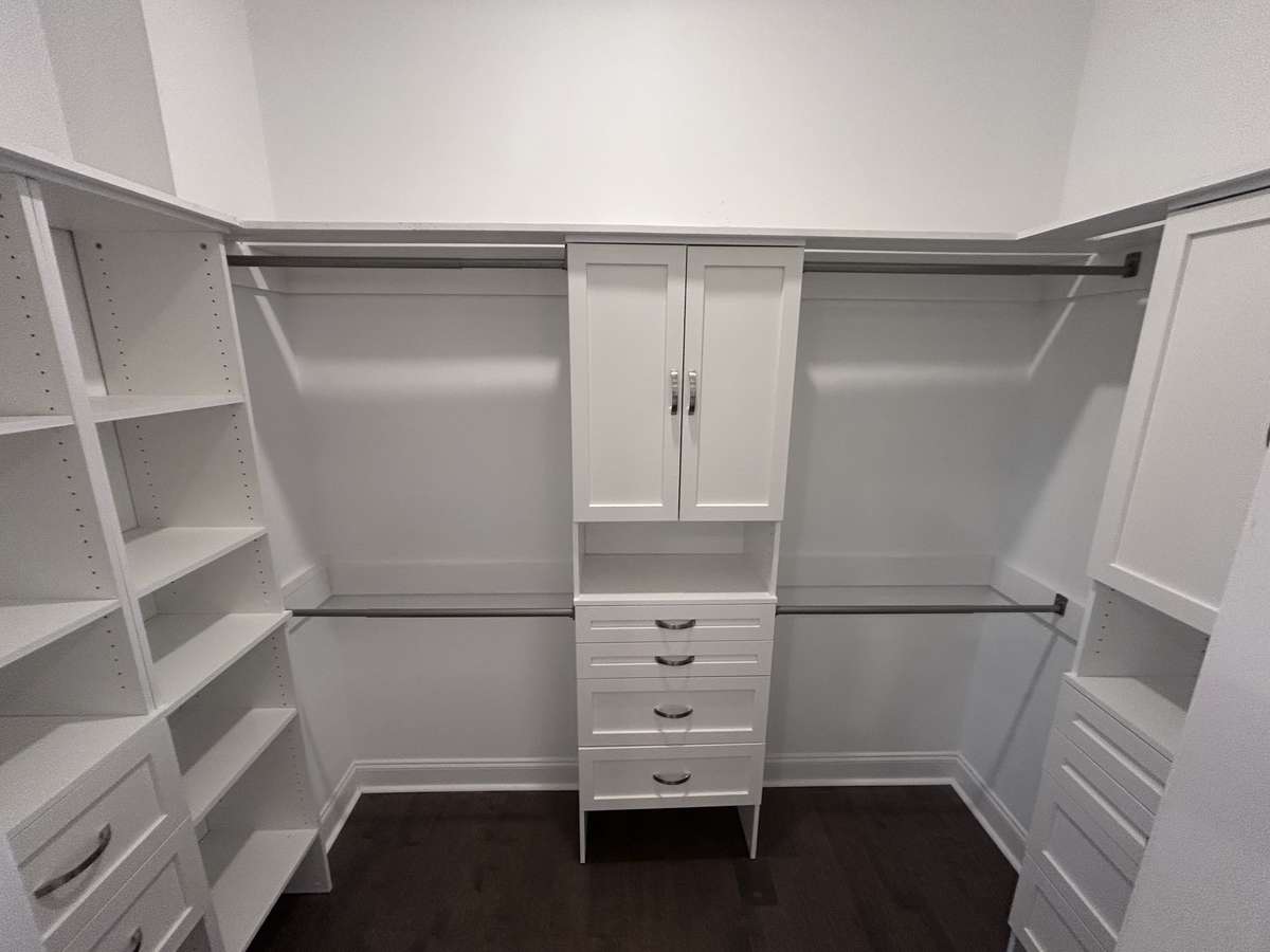 Beautiful California Closet Style Finishes in the Primary Bedroom Closet