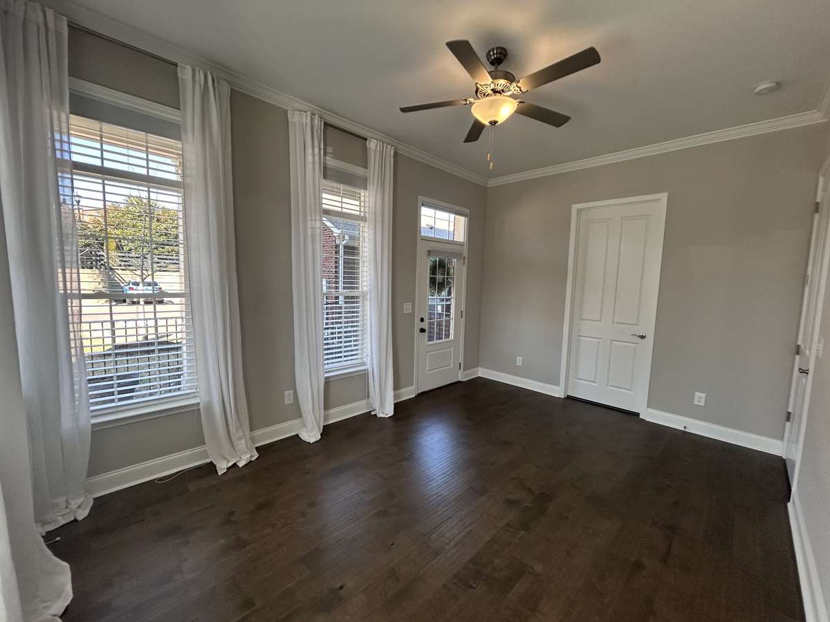 Primary Bedroom 8 foot doors, 10 foot ceilings, Crown Moulding. all window treatments stay,