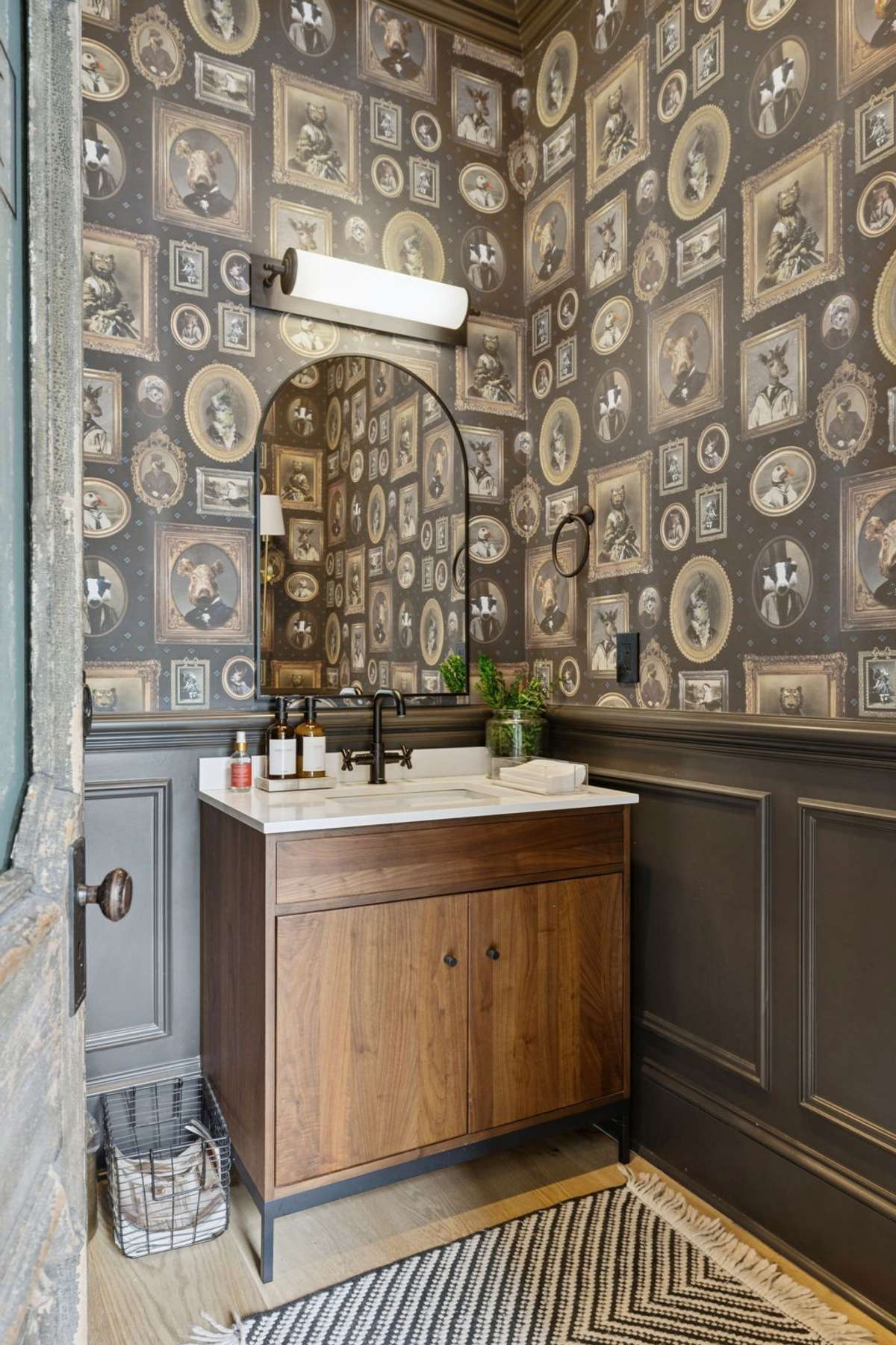 Beautifully decorated half bathroom on the main level.