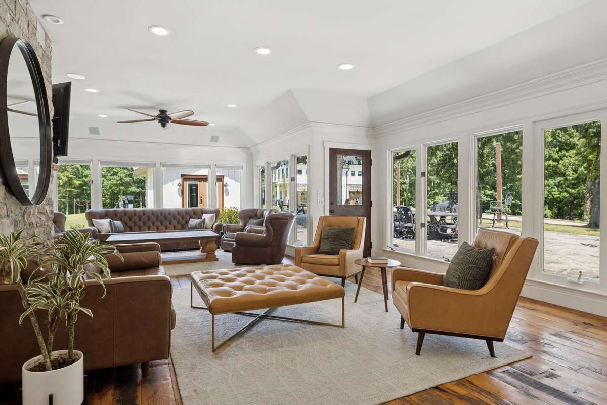 Family gathering space with large fireplace, open space designed with natural light!