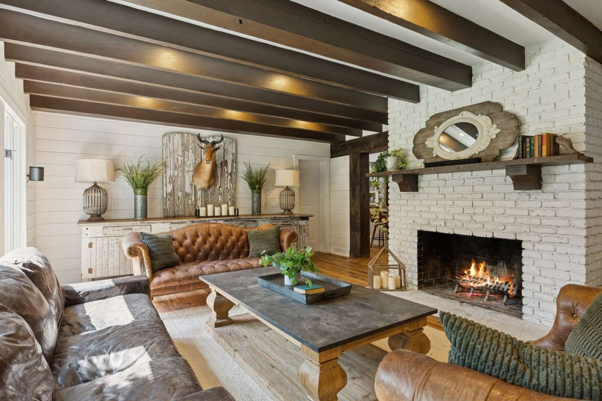 Another view of the living room and fireplace.