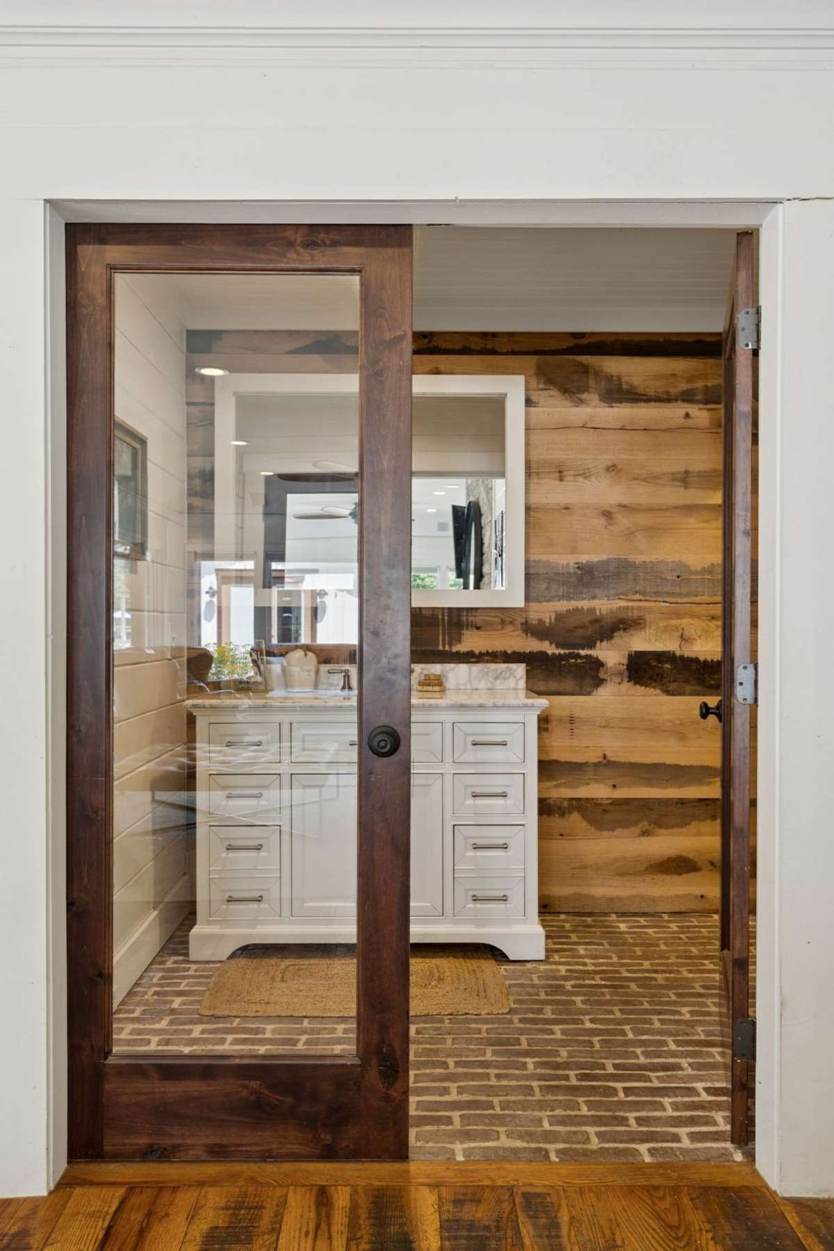 Half bathroom located in the family gathering room.