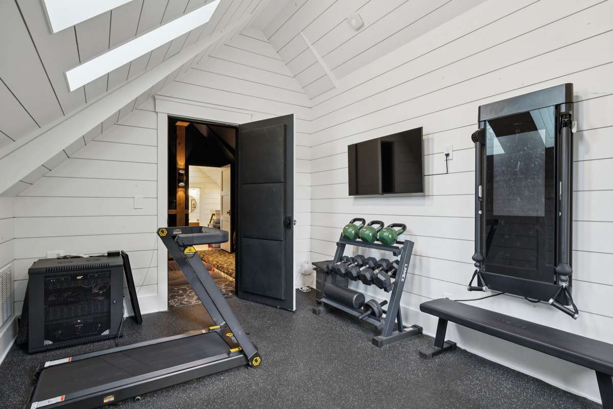 Workout room on Level 3 with skylights for much natural light.