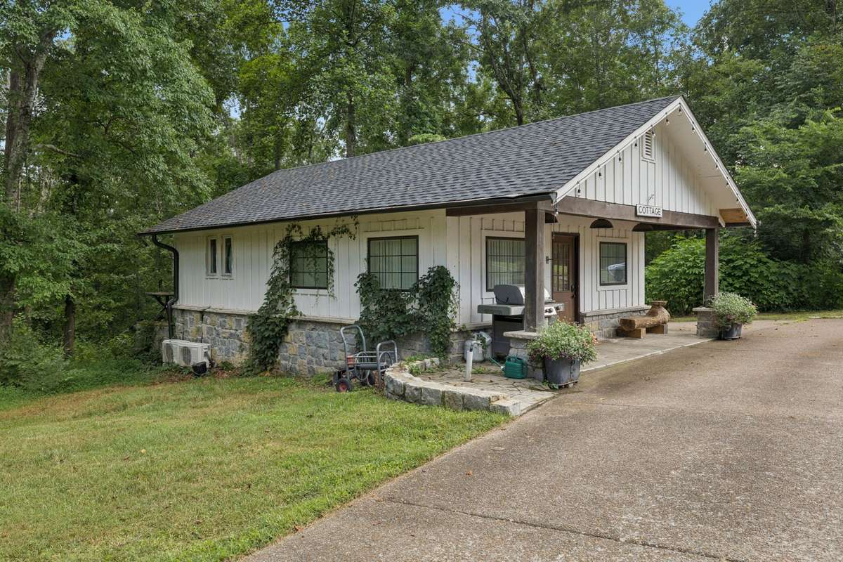 Cottage on 5530 Pinewood site that can be used as an office or possible guest cottage.
