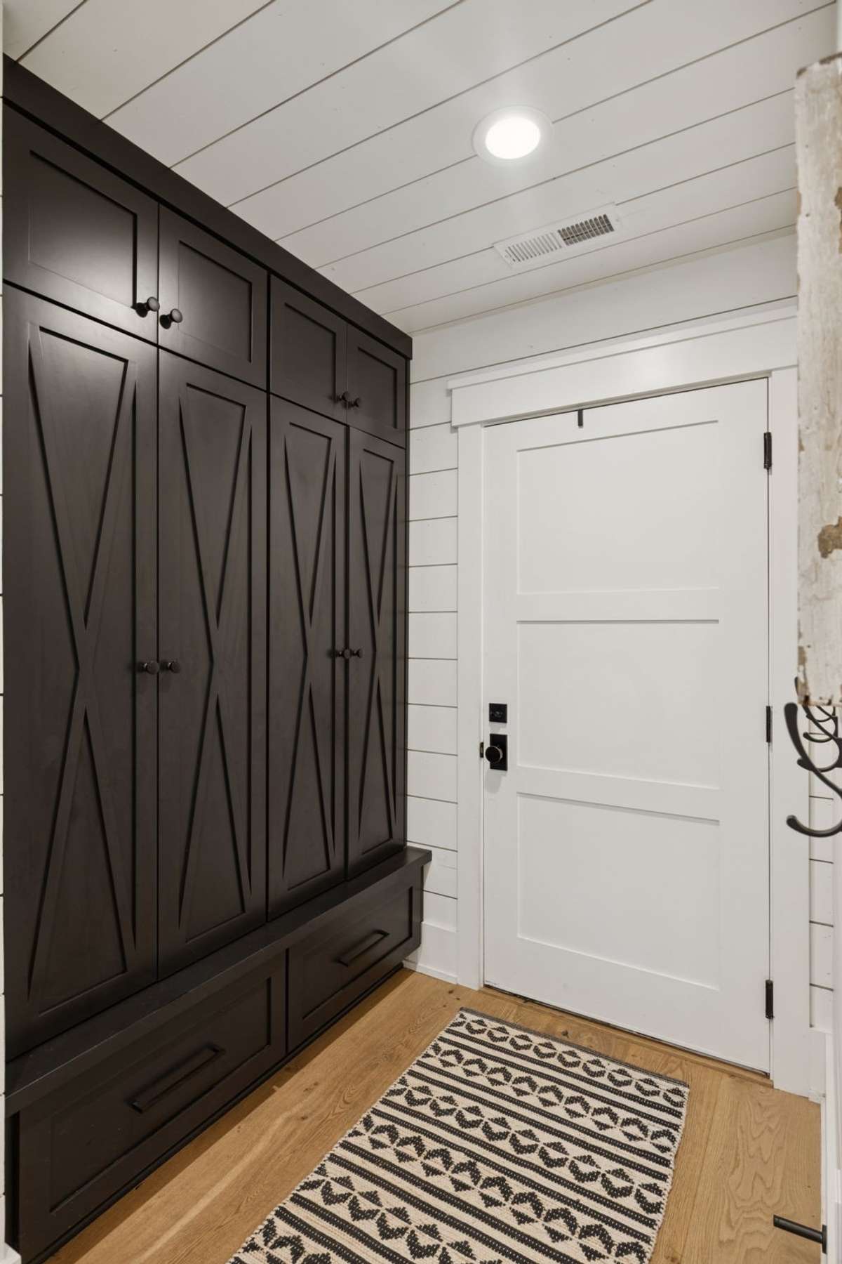 Mudroom storage from garage entry