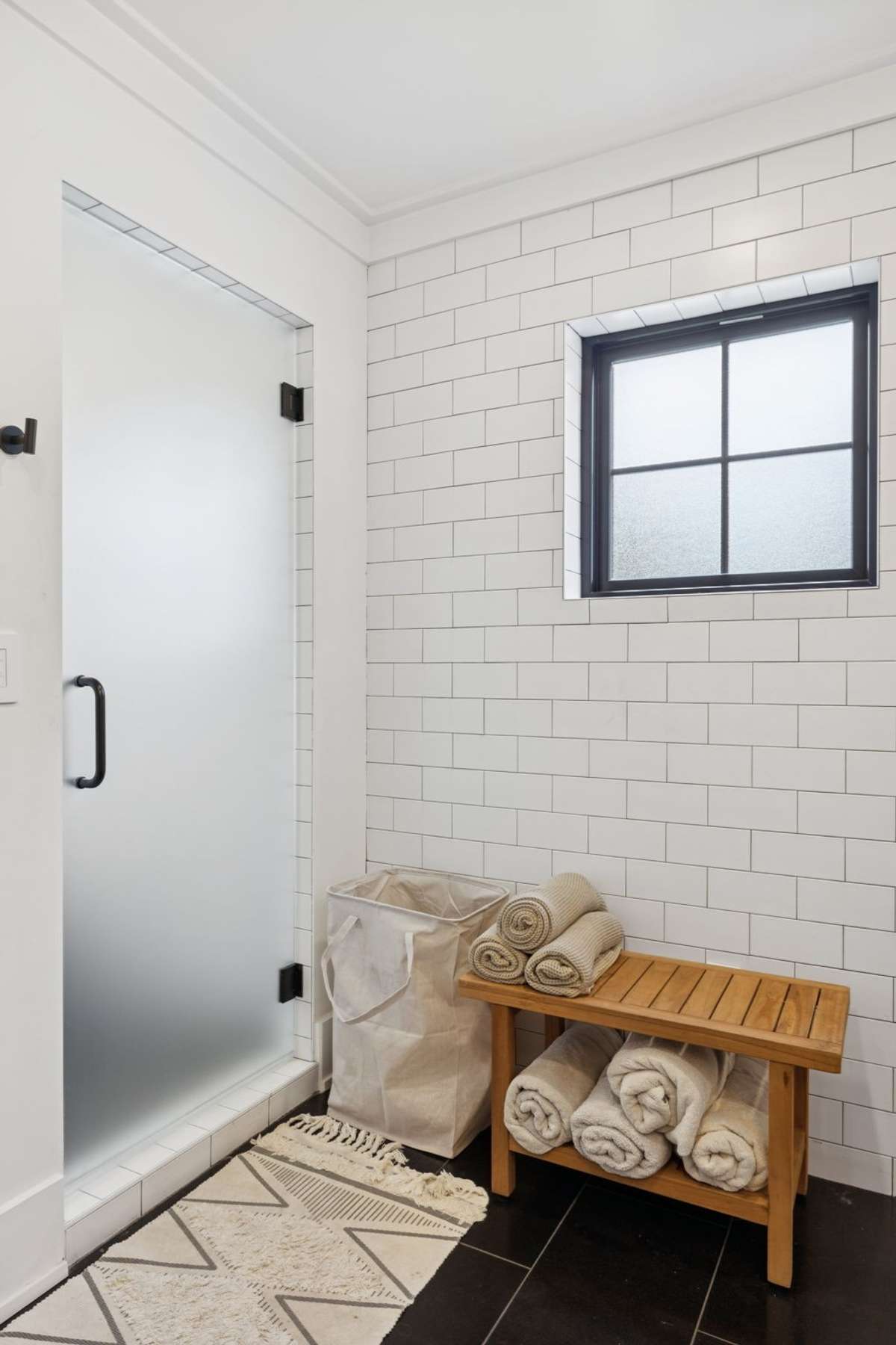 Large custom tile shower in master bathroom