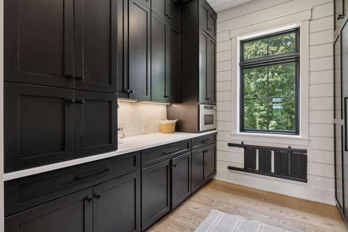 Pantry area with great storage space, oven, large double freezer area, wet space.