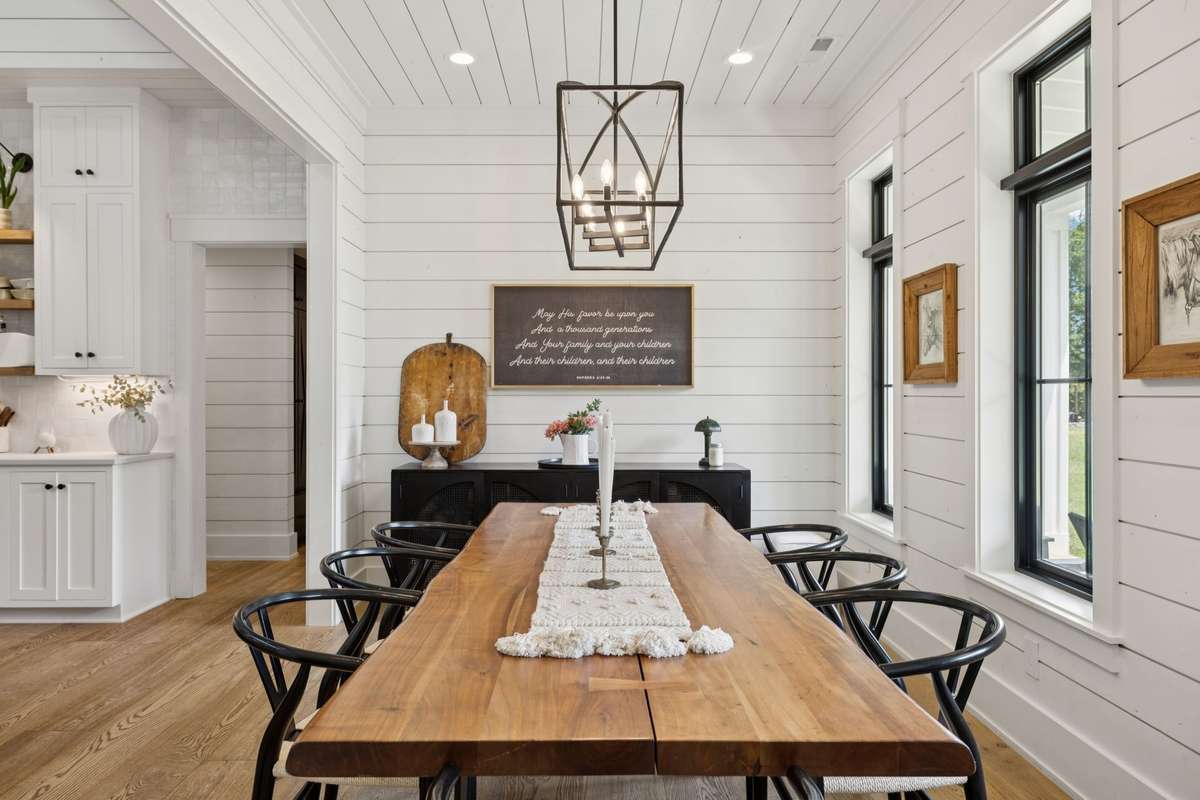 Large family dining room overlooking the front green space