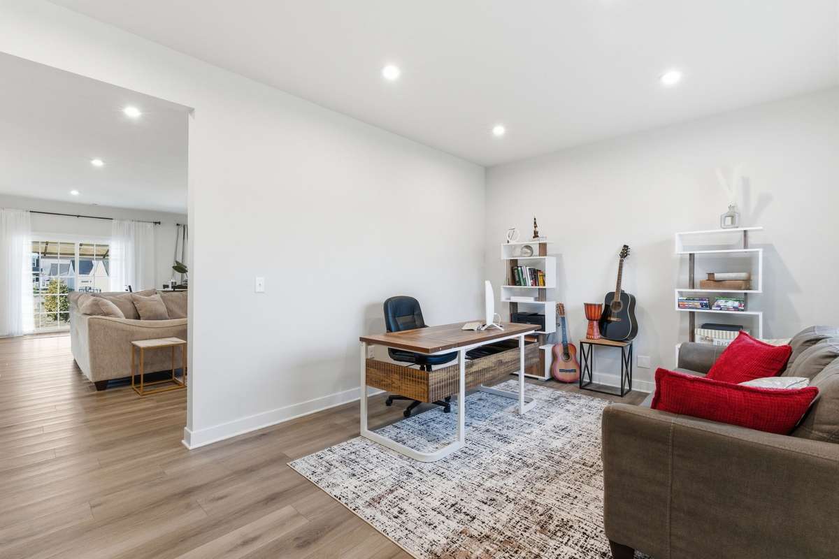 Front flex room - a great sitting room, piano room, playroom or office.