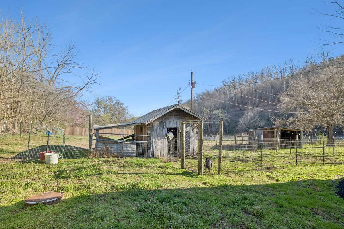 Additional paddock with outbuildings for the animals.