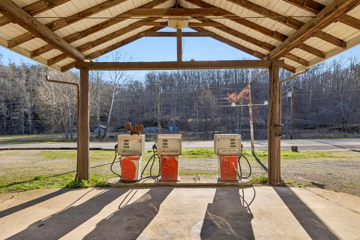 View from the front door of the workshop. Old gas pumps included.