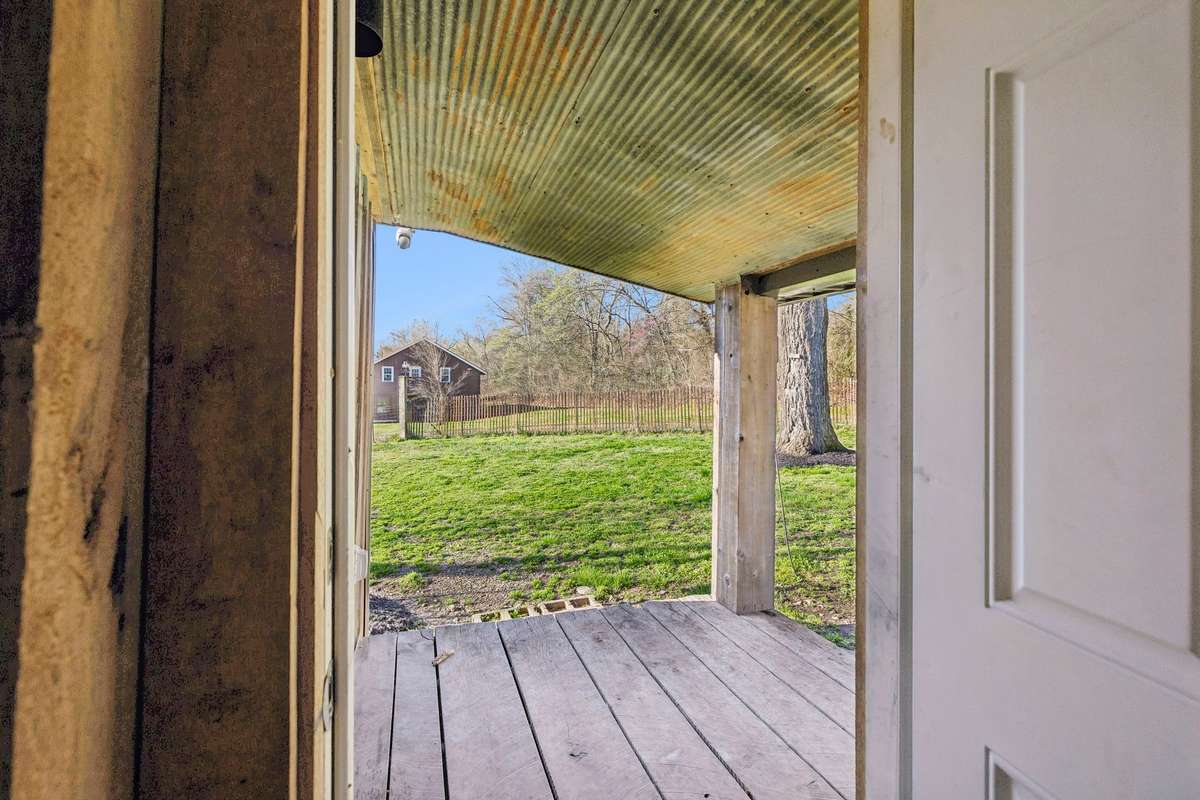 Back door exiting to covered back porch.