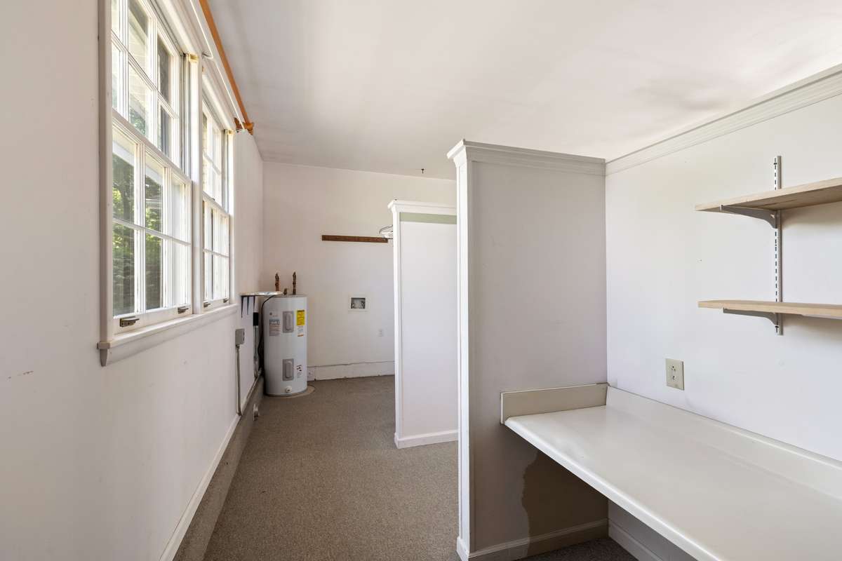 This View shows the work area and Laundry Area of the home in the Den Area