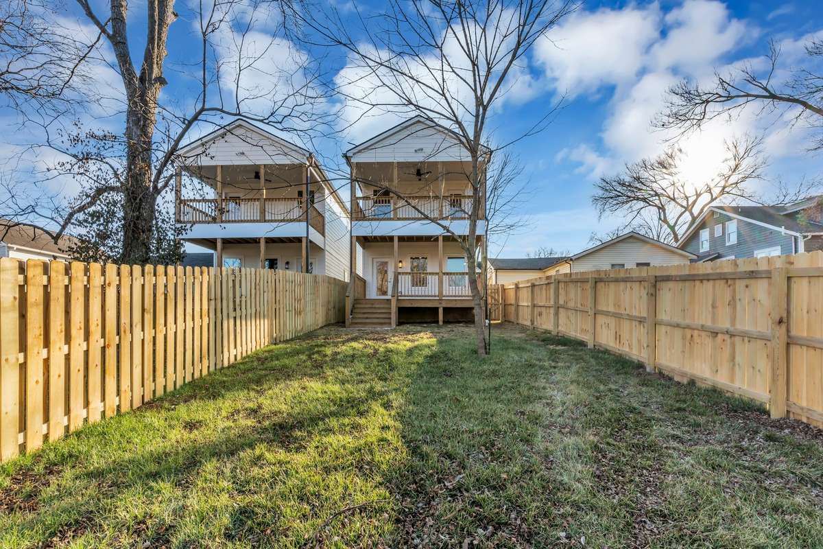 Large level fenced backyard.