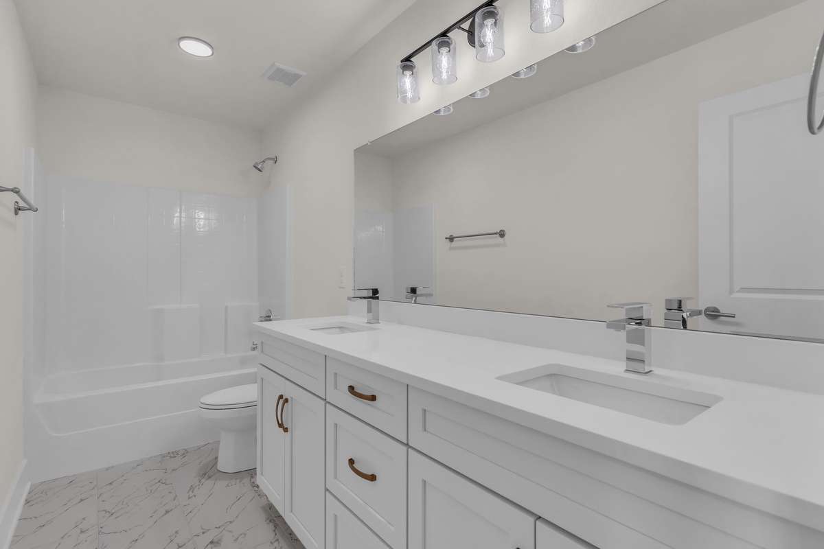 2nd full bathroom upstairs between the other two bedrooms.