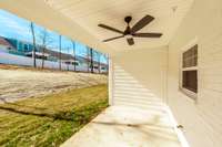 Stepping out back you'll see the covered patio area,