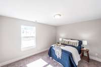 Upstairs you'll find 2 spacious bedrooms and 2 bathrooms.