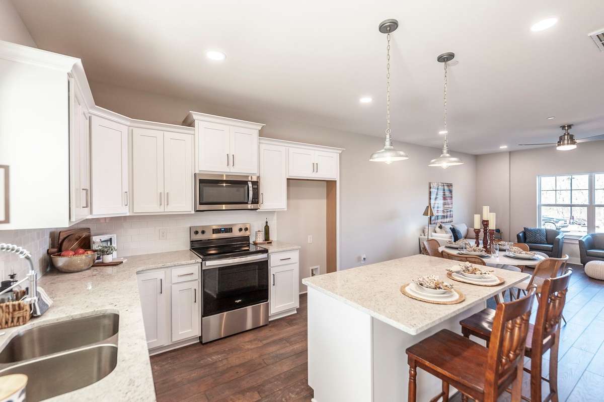 The large island offers additional seating and a great place for serving and prepping.