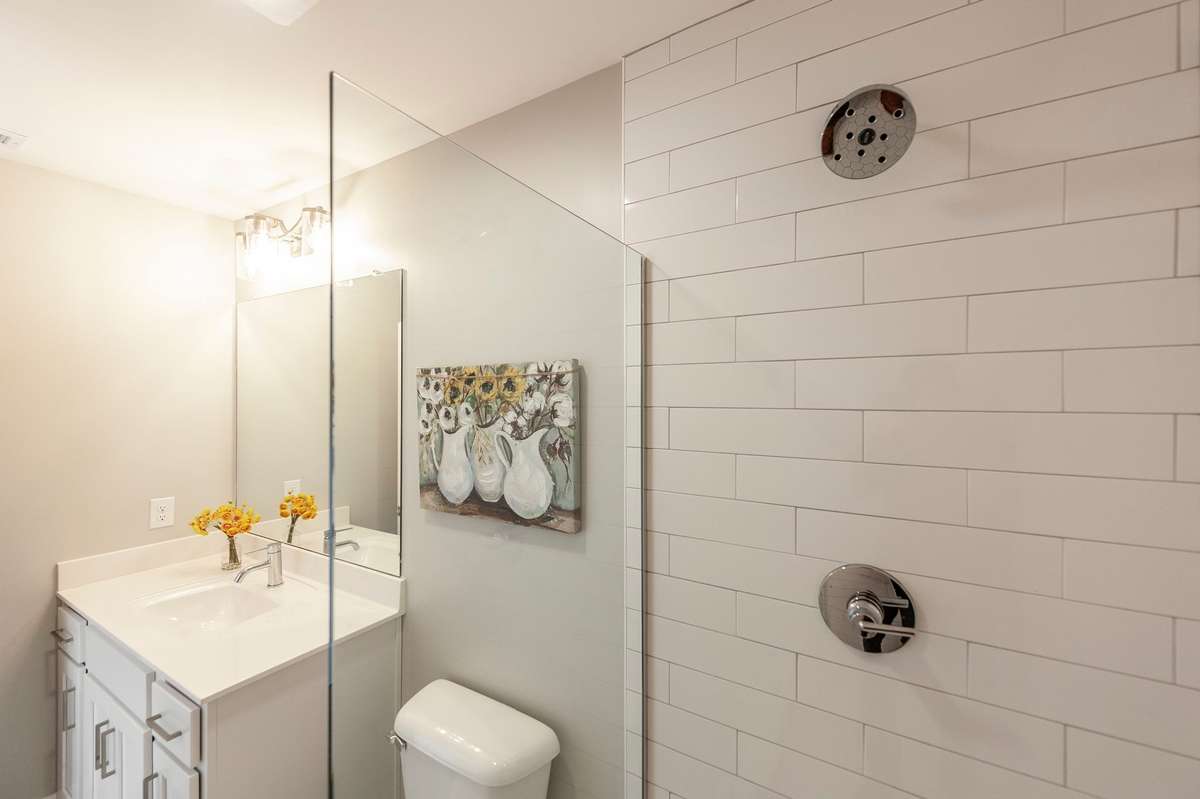 The bright white cabinets really brighten this space.