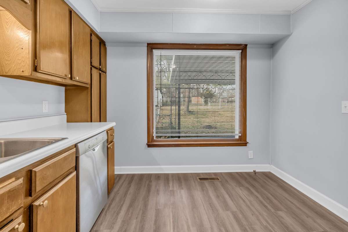 Enjoy your morning coffee overlooking backyard and covered patio