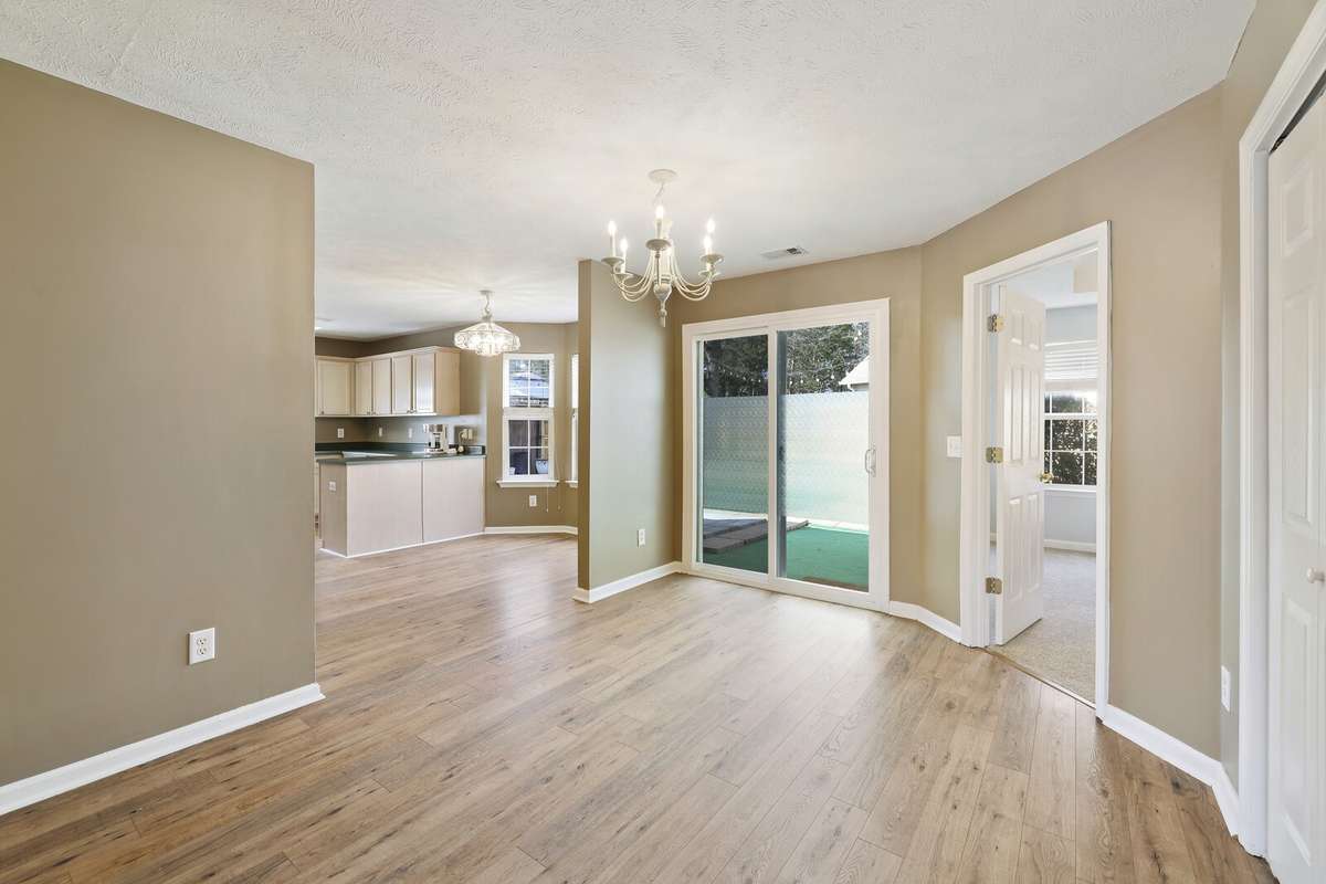 New sliding glass doors that exit to back yard