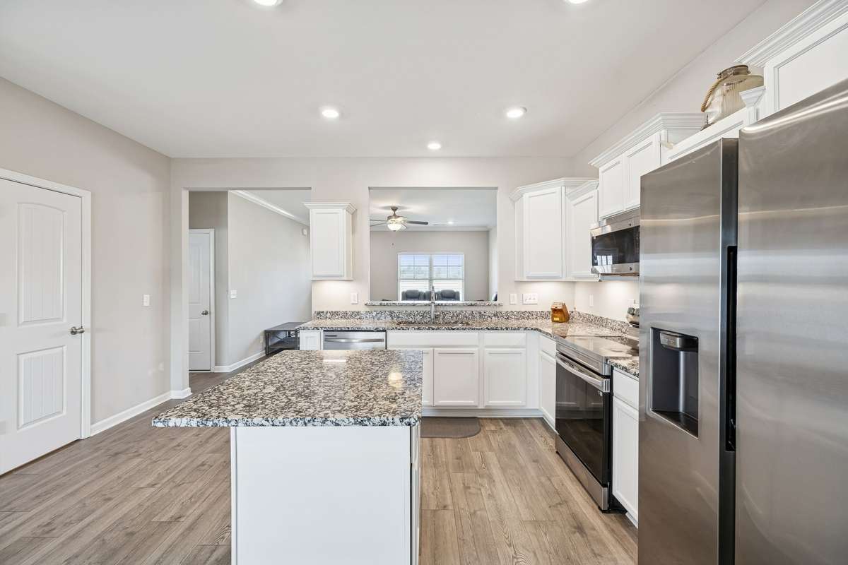 Samsung stainless steel appliances and a pantry complete this functional kitchen space! 501 Ruby Cate Way, Murfreesboro, TN 37128