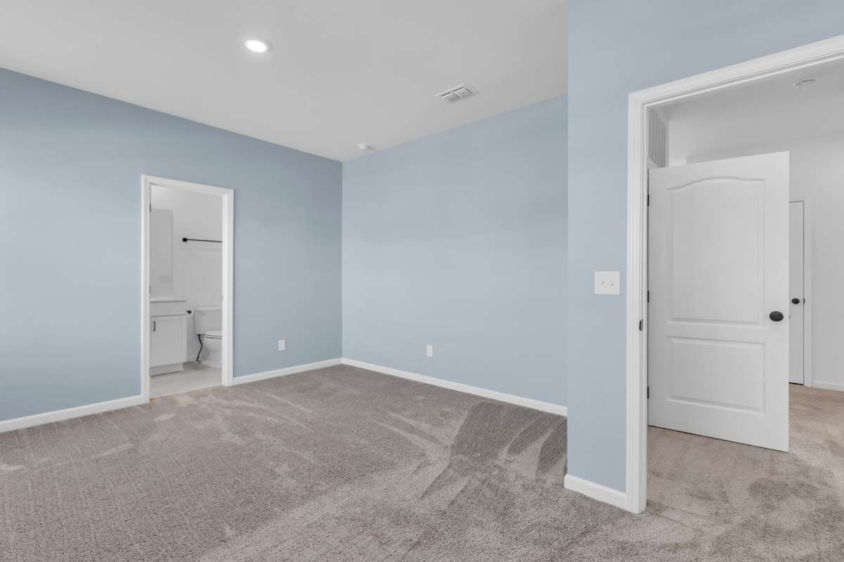 Bedroom with full bathroom.