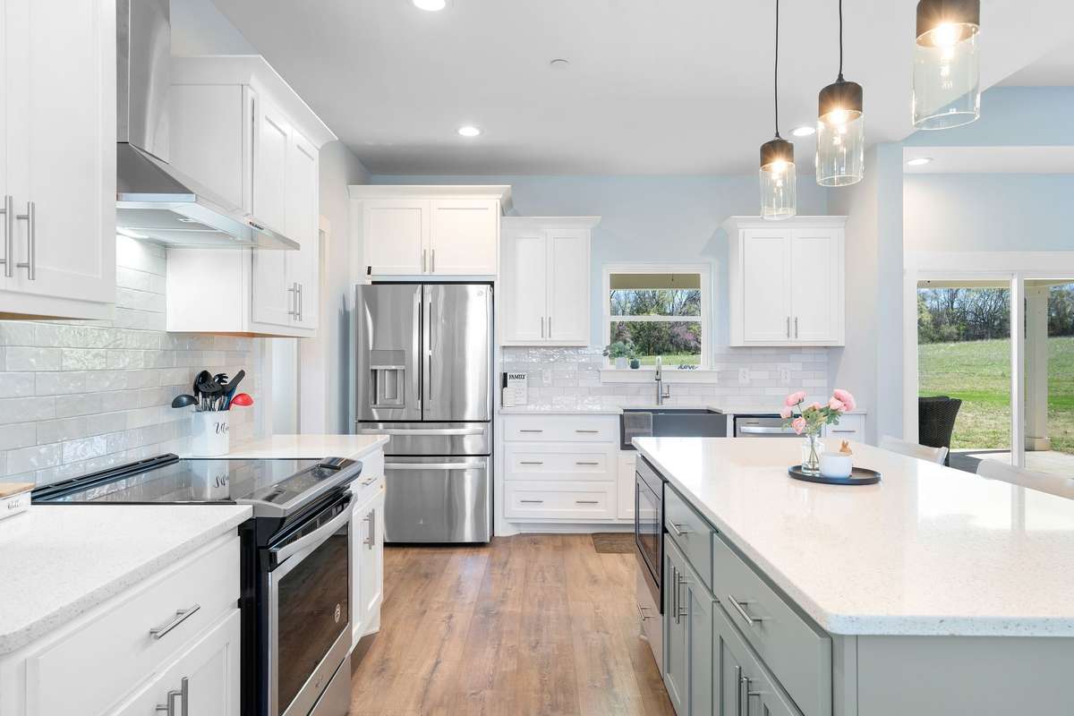 Quartz countertops and farm house sink with a window!