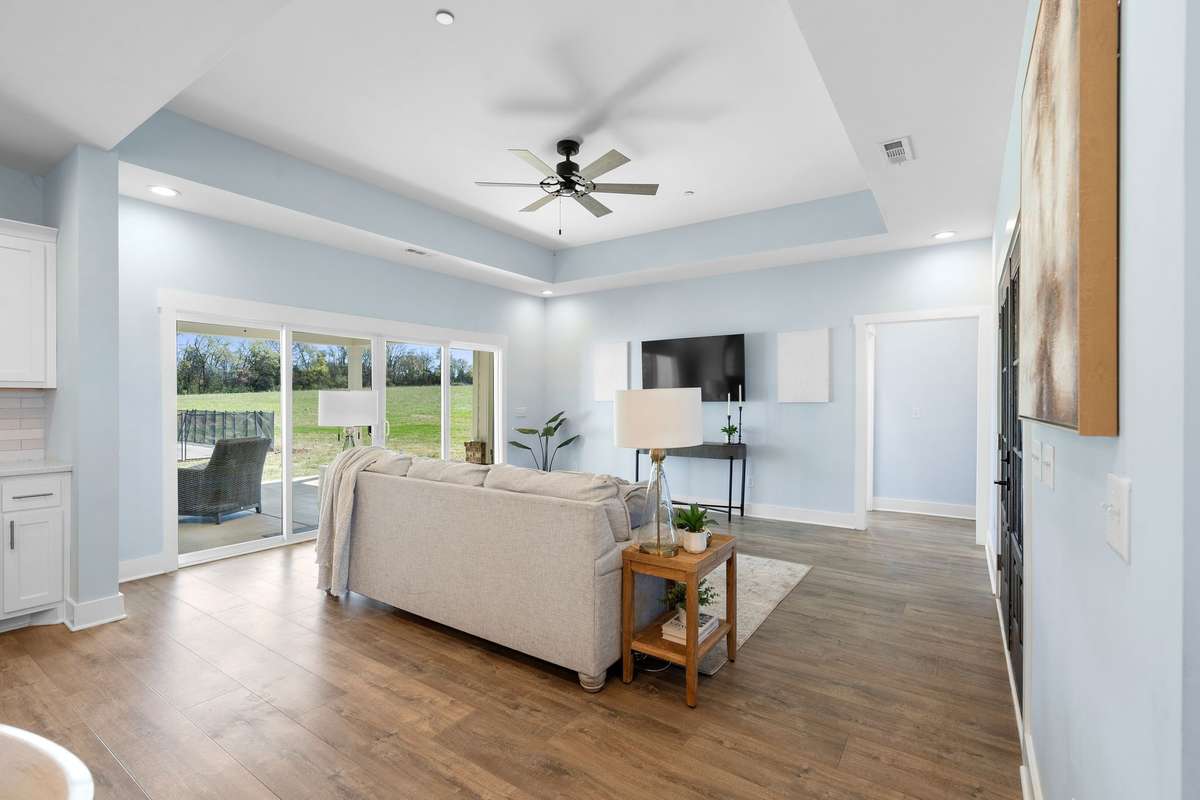 Spacious living room with wide plank flooring!