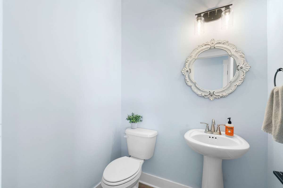 Powder room downstairs for guests!