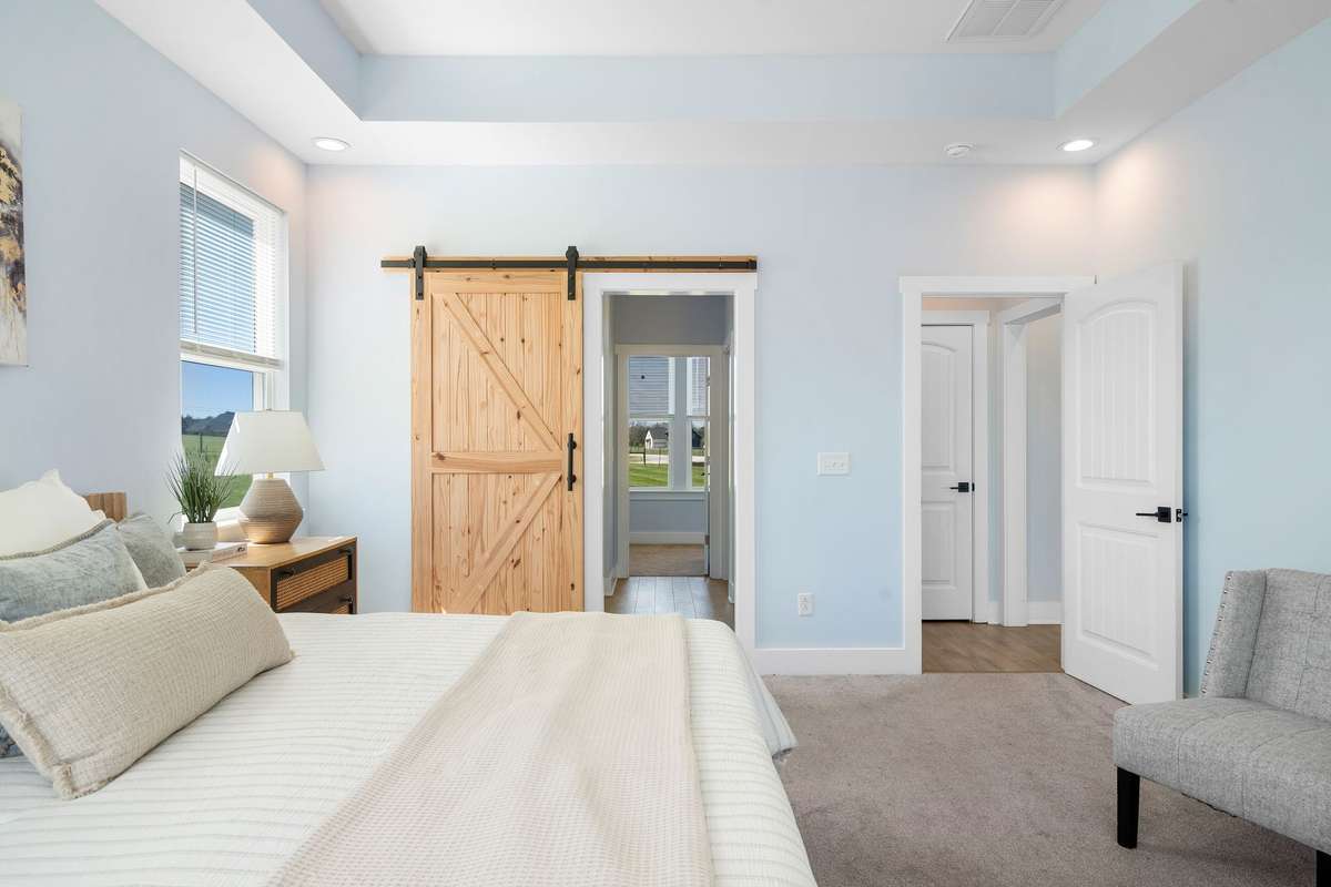 Barn door detail adds charm and character to the space.