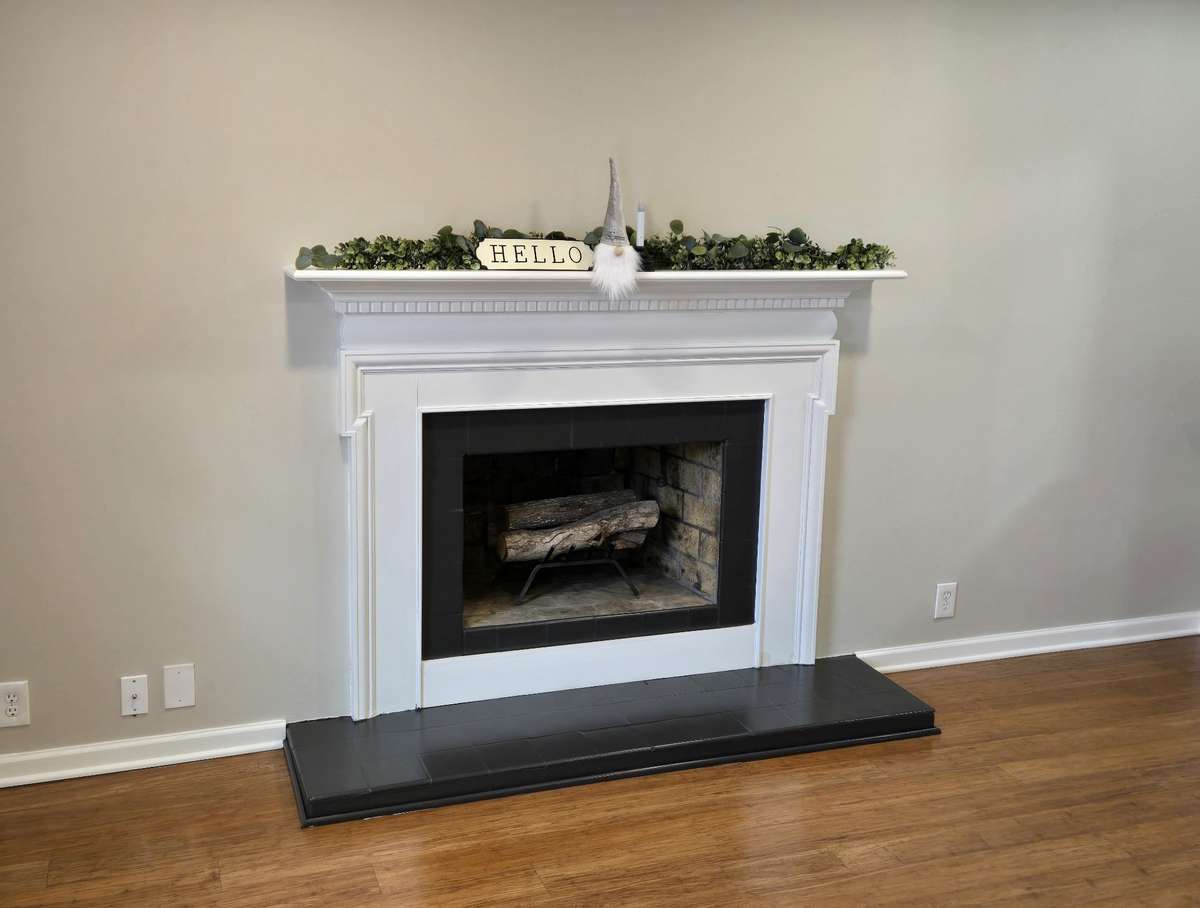 Freshly painted tile around the mantle!