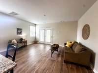 Spacious living room with two set ups for your TV, so very versatile for your different furniture layouts!!