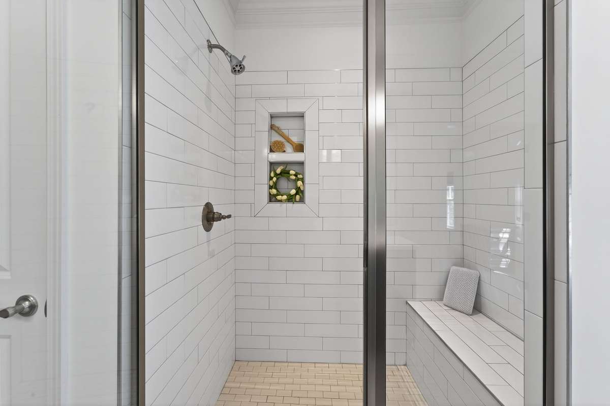 Primary Tiled Shower with Glass Doors