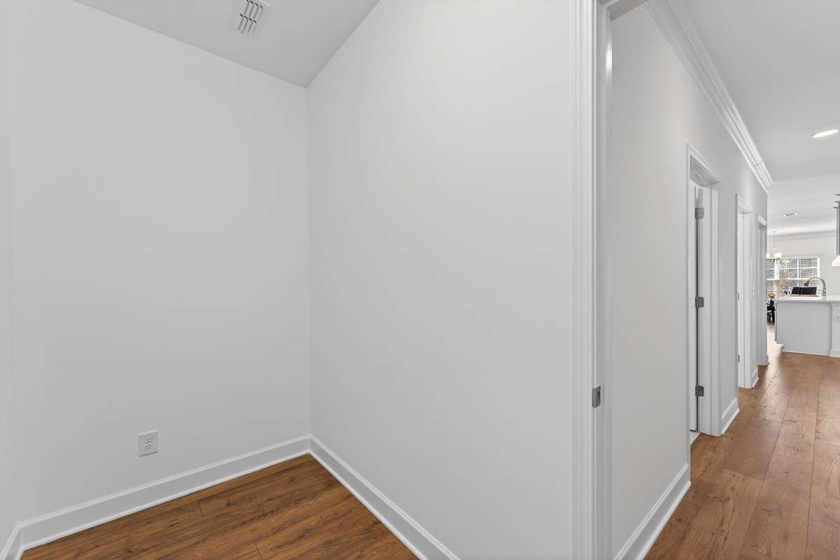 Flex room off of the garage next to the Laundry room. Room size is 9.9 X 4.9