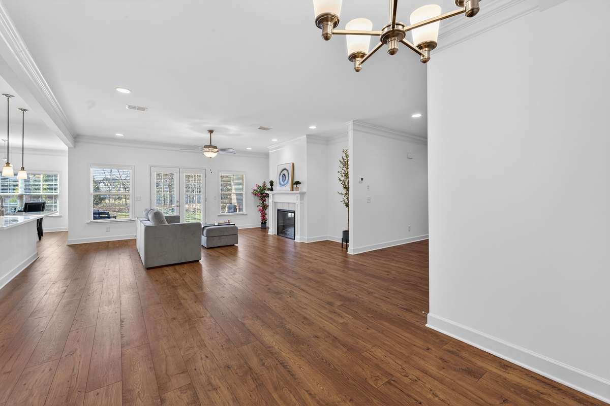Great Room with French Doors leading out to Covered Porch.