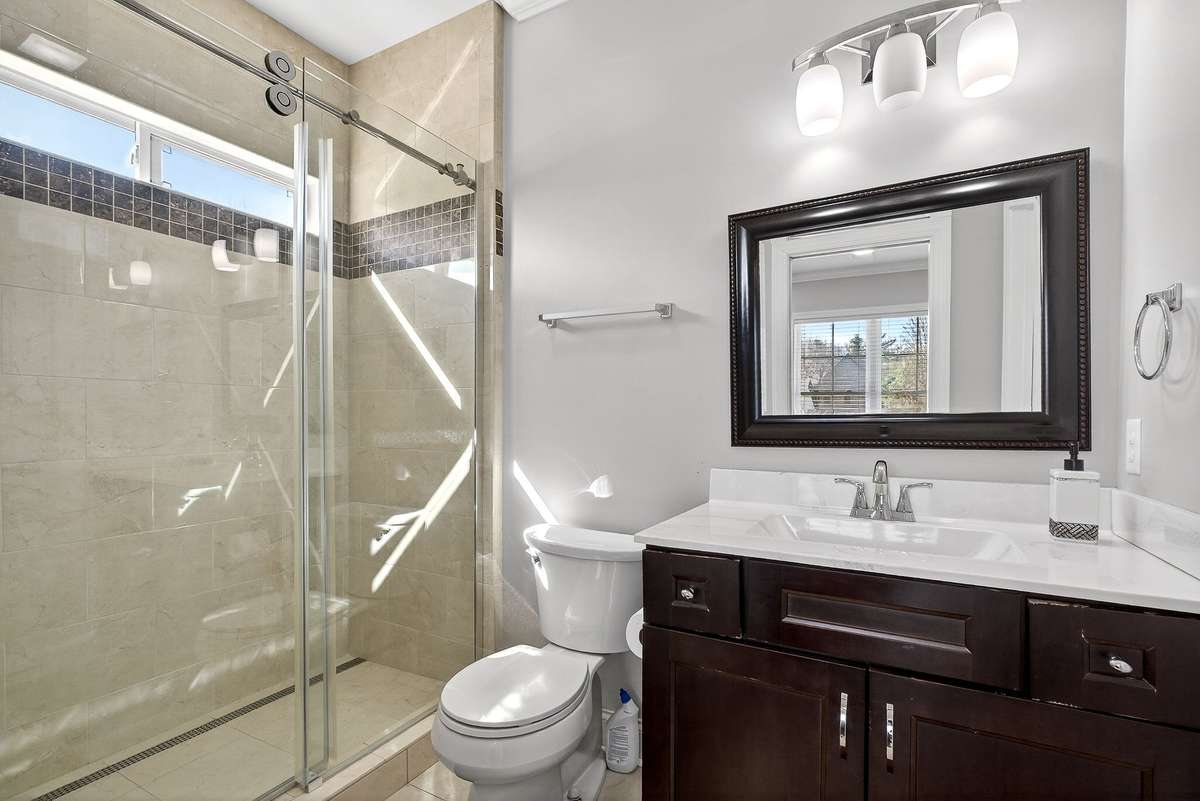 PRIMARY FULL BATHROOM WITH WALK IN TILED SHOWER