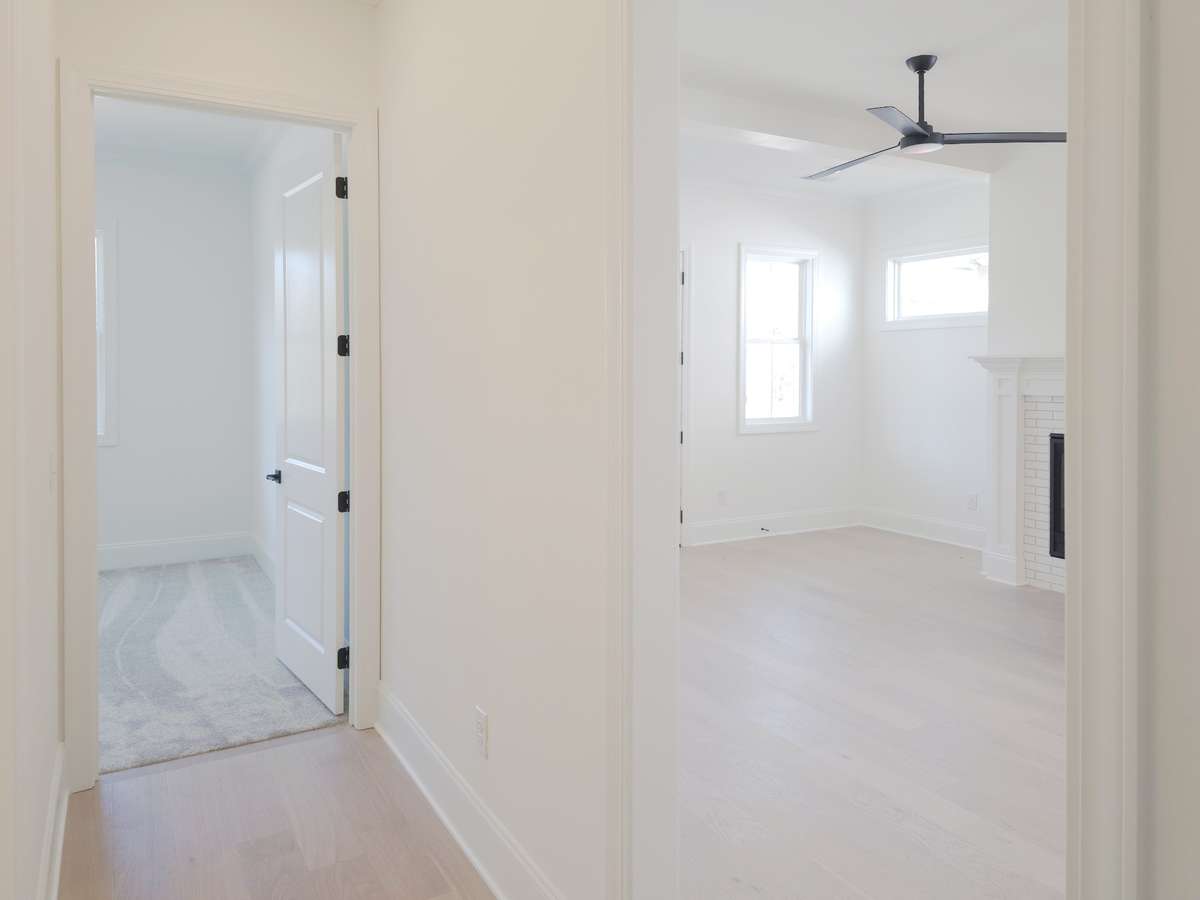 Adjacent to the living room, you will find 2 additional bedrooms and a full sized bath!