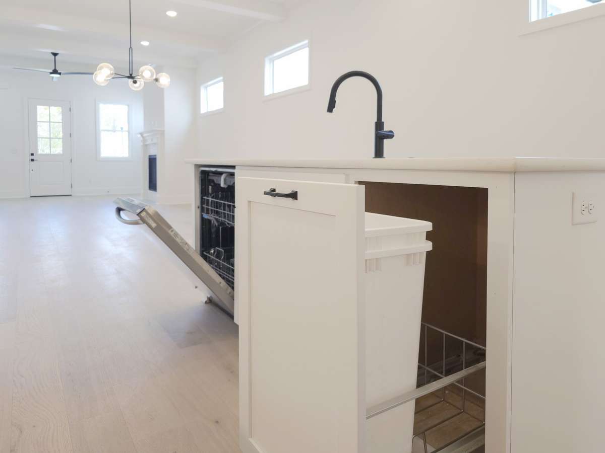 Keep your waste hidden with built-in trash bins - eliminating odors, saving space, and making cleanliness effortless